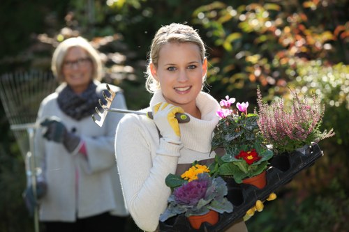A volunteer using a screen reader to access gardening instructions on a mobile device